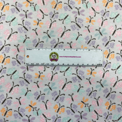 CLEARANCE Butterflies on Light Purple - Camelot Flannel