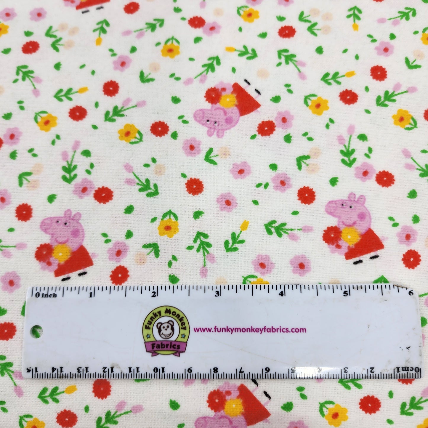 CLEARANCE Peppa Pig Bunches of Flowers on White - Camelot Flannel