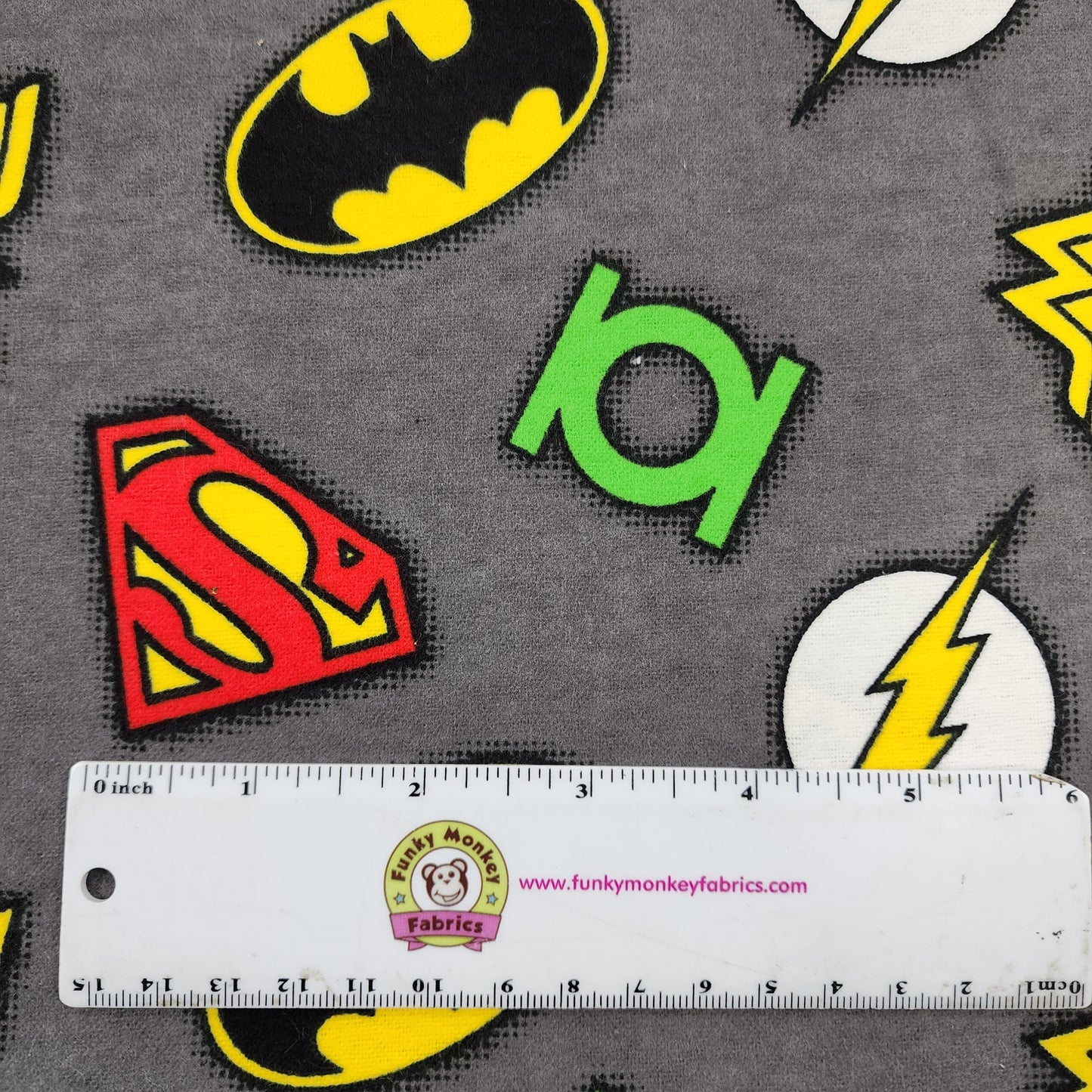 CLEARANCE DC Comics Multiple Logos on Grey - Camelot Flannel