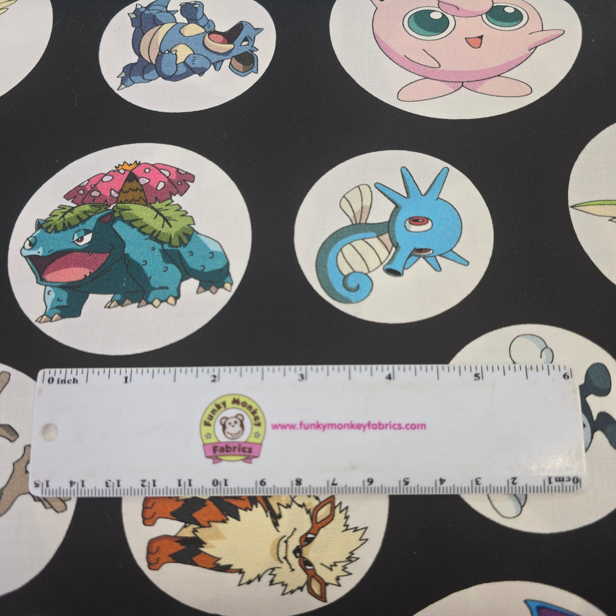 Black Pokemon in Circles - Robert Kaufman Cotton