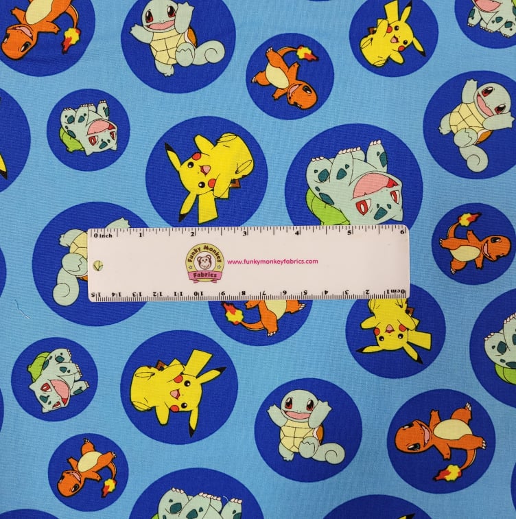 Pokemon in Circles on Blue - Robert Kaufman Cotton (17721-4)