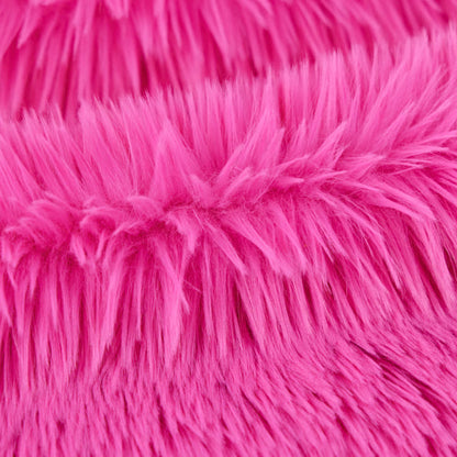 Close-up of bright pink fluffy fabric texture