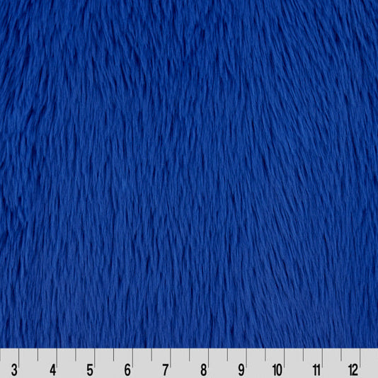 Blue fur texture with a ruler at the bottom for scale