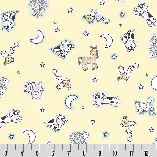 Children's fabric with animal and nature patterns on a yellow background