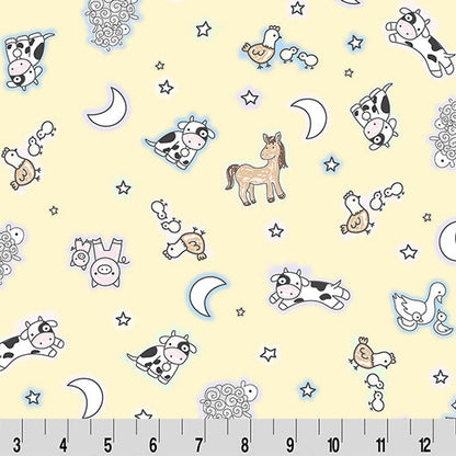Children's fabric with animal and nature patterns on a yellow background