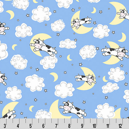 Cute cow illustrations on moons and clouds with a ruler at the bottom for scale.